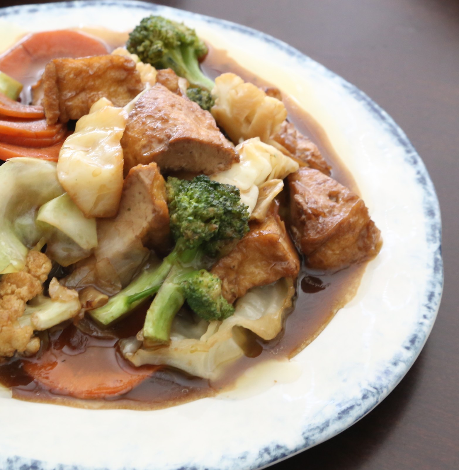 A Sane Gyaw Broccoli, cauliflower, carrots and cabbage sautéed with a light brown sauce